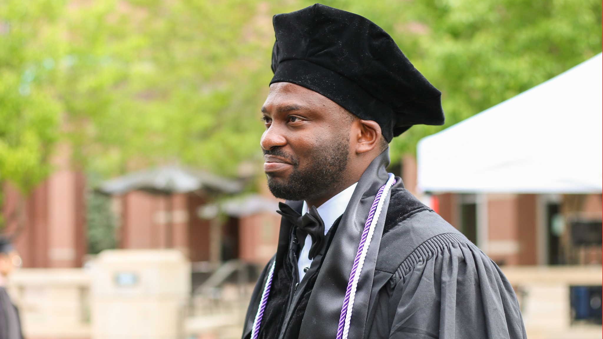 man in graduation outfit