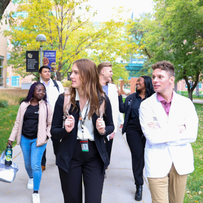 Group of students walking around campus